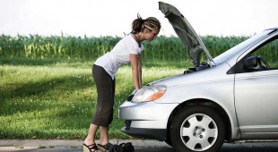 Lady with a broken down car