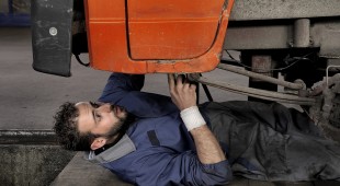 Mechanic working on a car